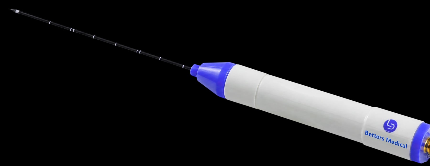 Baird MWA needle shown full length, from the distal trocar tip and graduated shaft through the handle to the connection interface